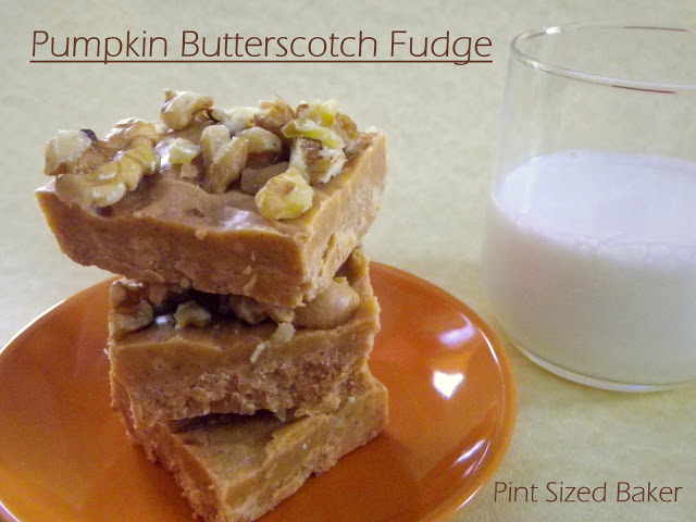 A photo of the pumpkin butterscotch fudge with walnuts and a cup of milk.