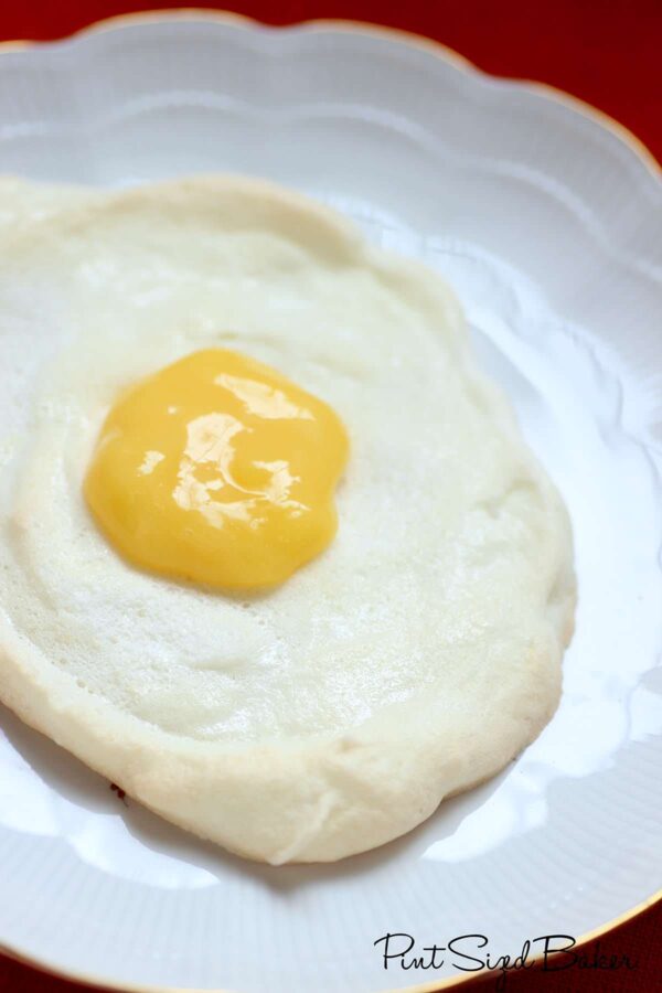 The kids are going to love these "Fried Eggs". Sweet meringue and lemon curd are the perfect way to start or end your day.