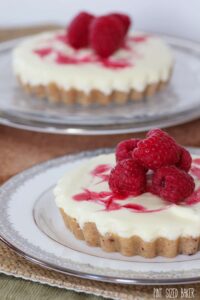 Easy and delicious White Chocolate Raspberry Tarts that are perfect for a Spring time dessert.