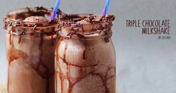 These Triple Chocolate Milkshakes are just what your chocoholic sweet tooth is craving! Chocolate milk, chocolate ice cream, and chocolate syrup - YUM!