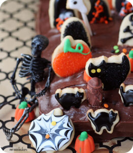 The kids are going to LOVE baking, decorating, and creating this fun Graveyard Cake for Halloween! Cookie decoration on a sheet cake!