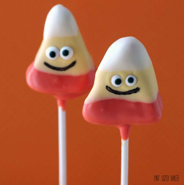 Cute and Easy Candy Corn Cake Pops. Fun for the kids to make for Halloween treats.