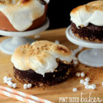 Easy and fun s'mores cake that is ready in a jiffy! Make them in mini pans so everyone gets their own!