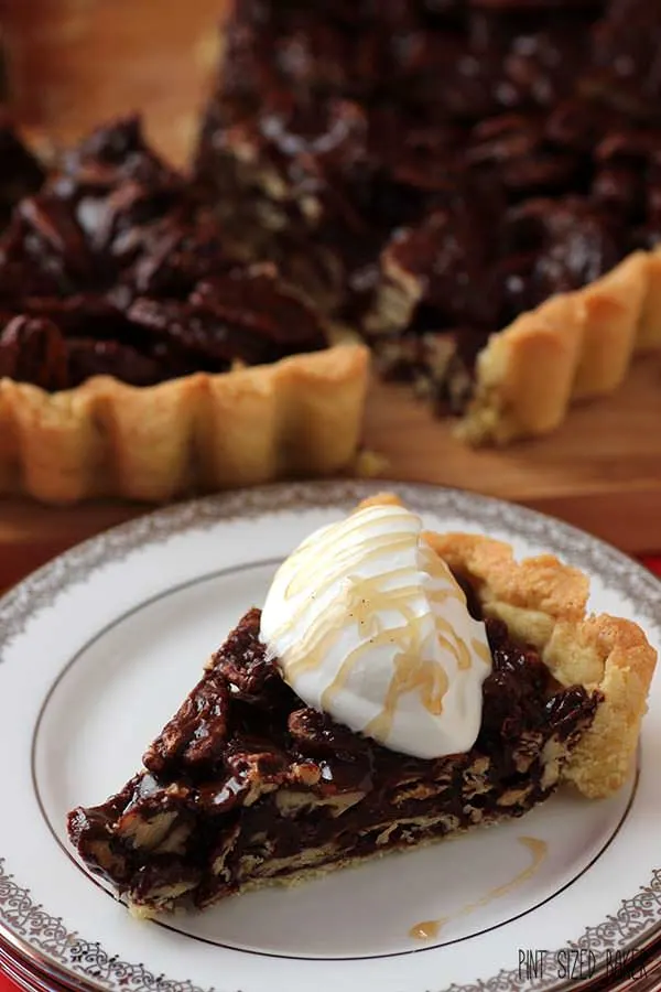 A sweet drizzle of butterscotch over a chocolate buttercsotch pecan tart. It's an amazing dessert.