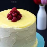 This amazing Raspberry Lemon Layer Cake is made with a white lemon sponge cake, homemade lemon curd, and sweet lemon buttercream frosting.
