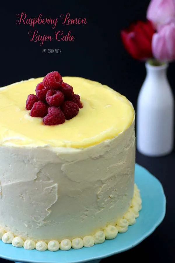 This amazing Raspberry Lemon Layer Cake is made with a white lemon sponge cake, homemade lemon curd, and sweet lemon buttercream frosting.