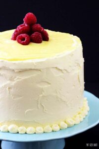 Three layers tall, this Raspberry and Lemon Layer Cake is sure to please my lemon loving family!