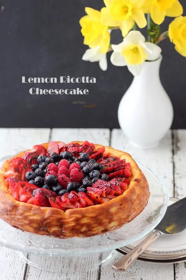 Lemon Ricotta Cheesecake with mixed berries and chocolate syrup. from #dietersdownfall.com