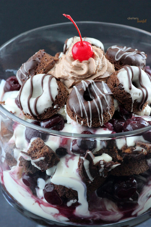 Amazing layers of Chocolate Donuts, White Chocolate Pudding and Tart Cherries. Make this Trifle from #DietersDownfall.com