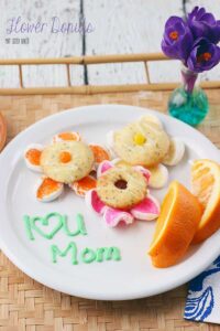 This Mother's Day, make mom breakfast in bed and deliver some flowers all in one swoop with these Flower Donuts.