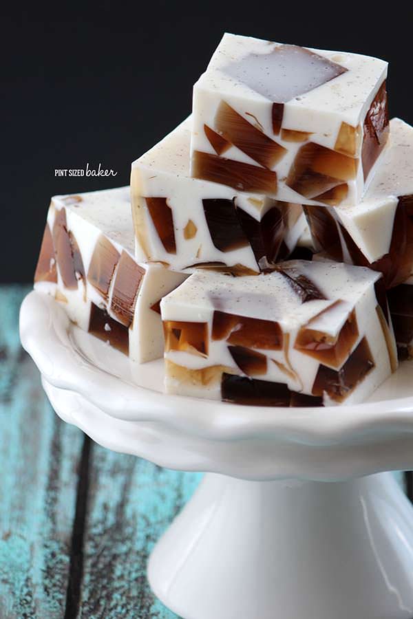 Close up of cubed root beer Jello on a plate.