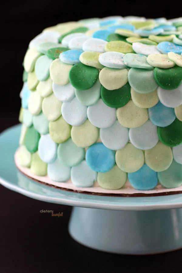 Multiple shades of green and blue make up this Mermaid inspired cake. 