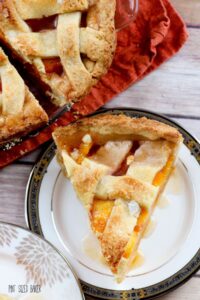 A generous slice of this perfect peach pie is ready and waiting for you. Well, after you bake it of course.