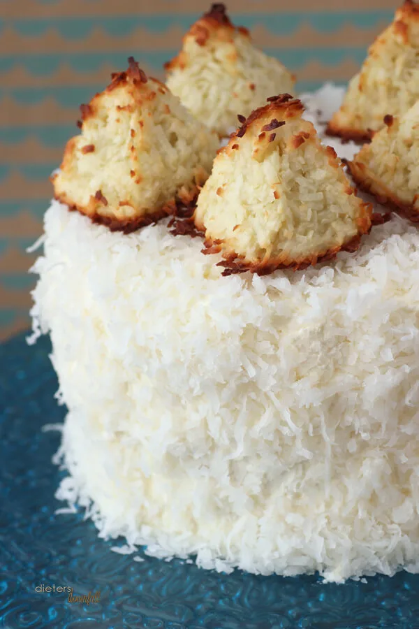 I love Coconut and this Triple Coconut Cake is calling my name! Cake, frosting, pudding and macaroons - i love it all! from #DietersDownfall