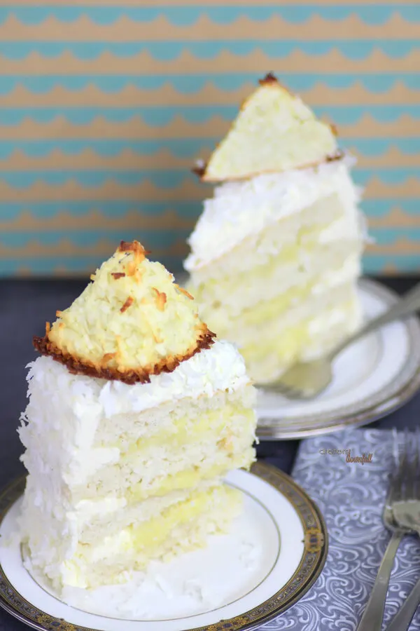 Layers of Coconut Cake, Coconut Pudding, and Coconut Frosting topped with Macaroons. Coconut Love. from #DietersDownfall