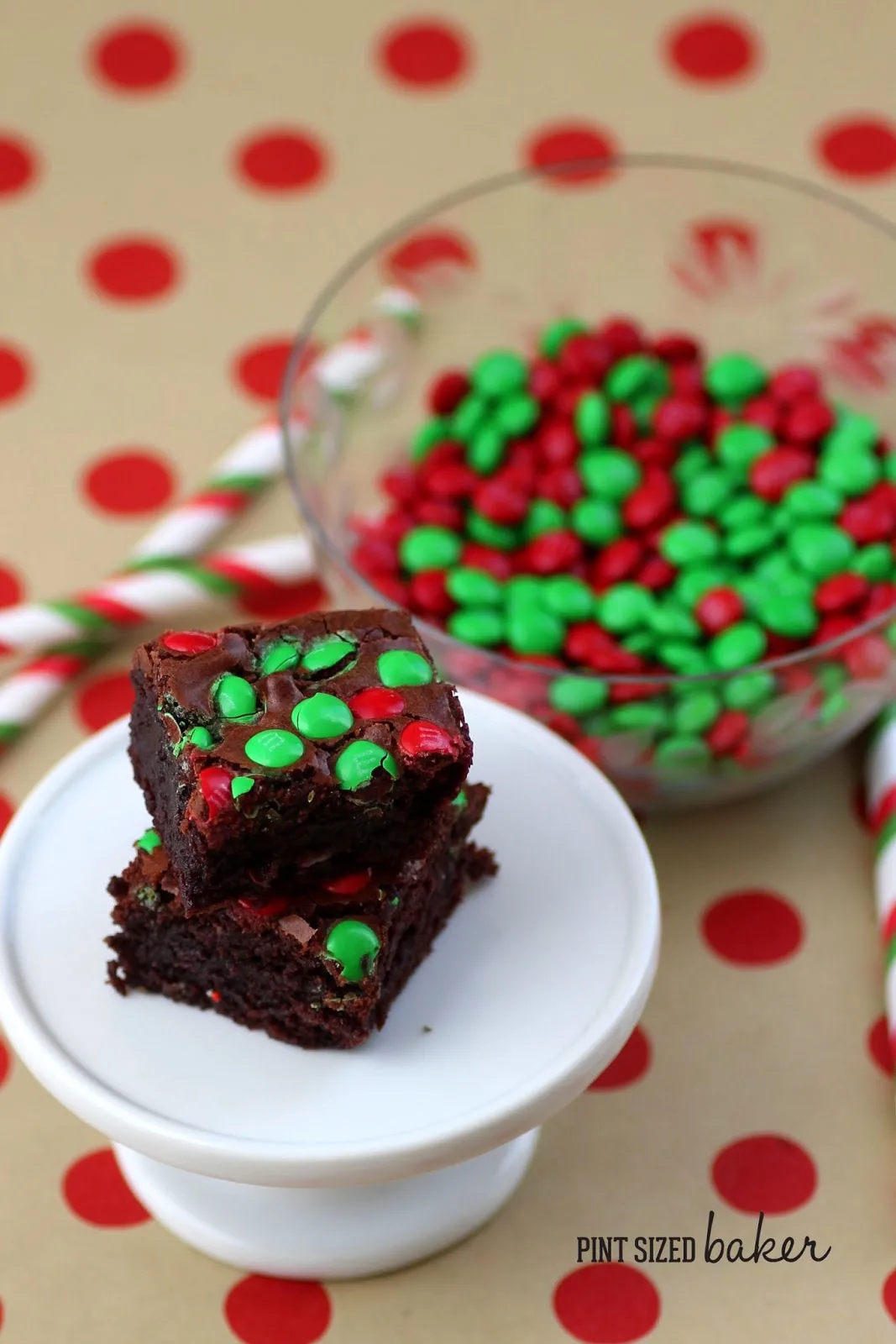The Christmas season calls for these Candy Cane Kisses Brownies that are stuffed with a kiss and topped with mini M&Ms. Perfect for the kids!