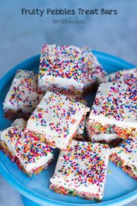 The kids LOVE these fun and colorful Fruity Pebbles Bars with a generous layer of vanilla frosting and covered in rainbow sprinkles.