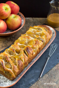 Layers and layers of pull apart bread full of chunks of apples and covered in caramel sauce. Perfect for a fall dessert.