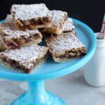 Homemade Walnut Raspberry Bars are the perfect mid-day treat with a cup of tea.