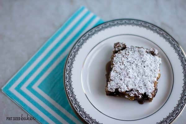 Homemade Walnut Raspberry Bars are the perfect mid-day treat with a cup of tea.