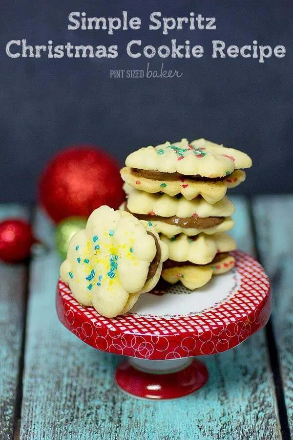 Simple Spritz Cookie Recipe with some fun sprinkles and then sandwiched with Rolo candies. They were amazing!