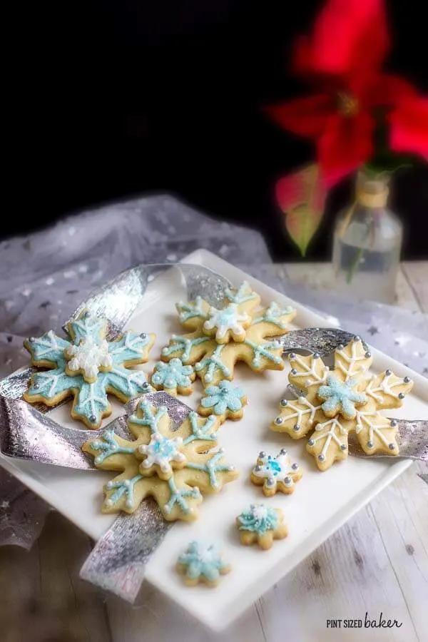 Hate decorating Christmas cookies with royal icing? Use Buttercream Frosting instead and get the same stunning look!