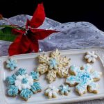 Easy Snowflake Sugar Cookies decorated with buttercream frosting. An easy alternative to royal icing.