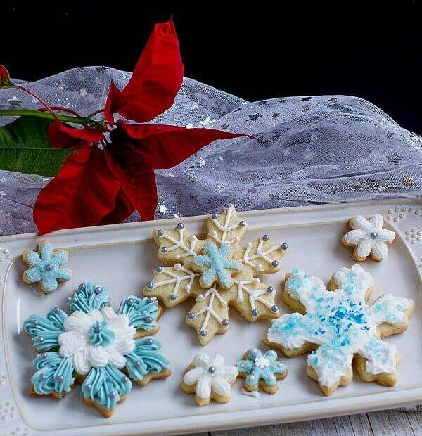 Easy Snowflake Sugar Cookies decorated with buttercream frosting. An easy alternative to royal icing.