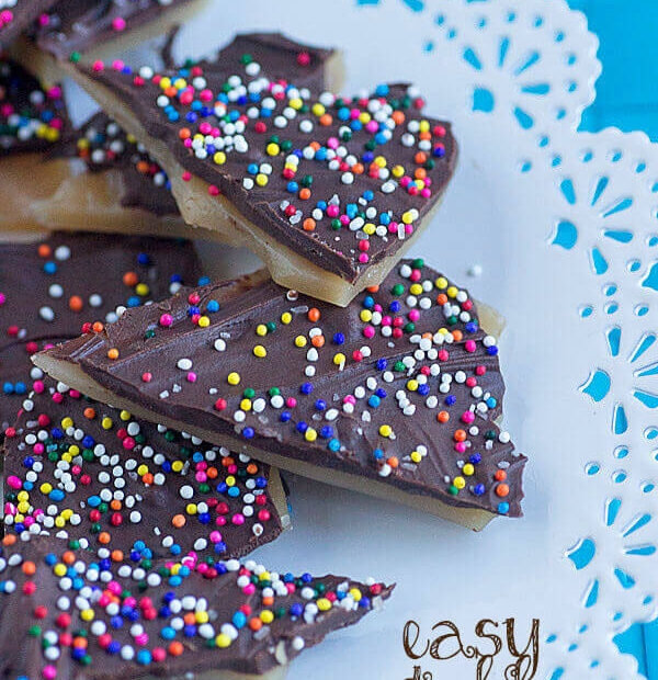 Easy Toffee covered in chocolate and rainbow sprinkles! It's a great snack to whip up and enjoy!