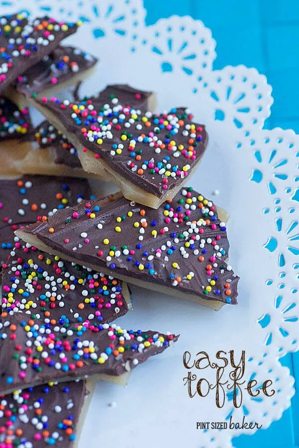 Homemade Toffee Candy covered in chocolate and rainbow sprinkles! It's a great snack to whip up and enjoy!