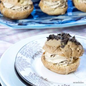 Easy Cream Puffs that are spiked with a shot of espresso and some chocolate covered coffee beans.