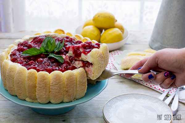 A horizontal image of a slice of the cake being lifted away from the dessert. 