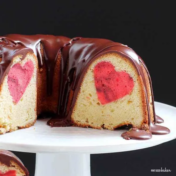 A square image showing off that beautiful strawberry pound cake heart inside the bundt cake.