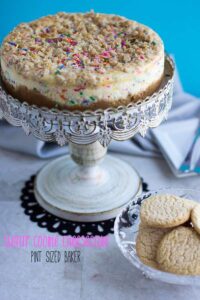A yummy Sugar Cookie Cheesecake that is full of sugar cookie flavor and tons of rainbow sprinkles. It's a great dessert to brighten up any day!