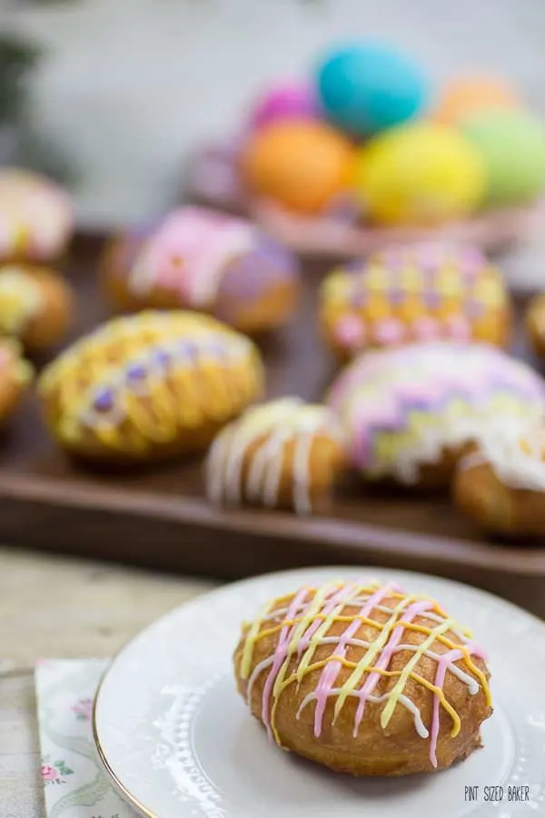 Bright spring colors decorate fun Lemon Jelly Donuts. They are perfect for an Easter celebration!