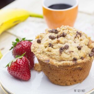 Banana Nut Muffin with chunks of banana and a sweet crumble topping.