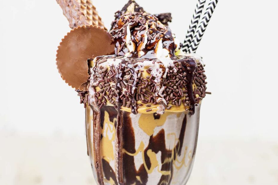 I'm going to belly flop into this Chocolate Peanut Butter Monster Milkshake! Loaded with Reeses, Nutty Bar, and a slice of peanut butter pie!