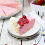 Strawberry Rhubarb Frozen Yogurt Pie. An easy recipe to make this summer. Use your favorite Lucky Leaf pie filling to make an amazing dessert!