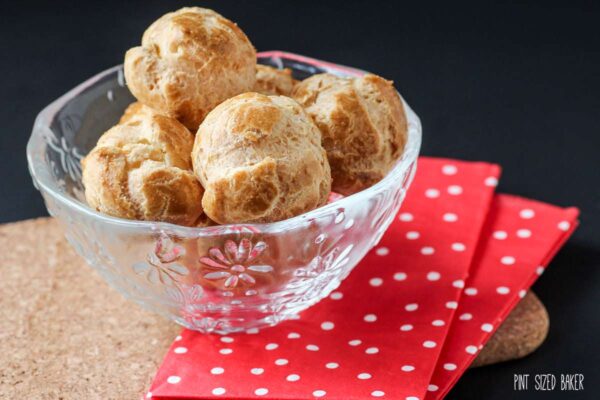 Light and puffy, perfectly made Pâte à Choux shells. Fill them with pudding, custard, ice cream, or whipped cream.