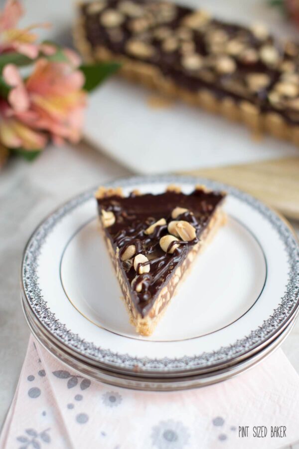 Peanut and Caramel Tart that is quick to make but so yummy to eat! I'll take two slices please.