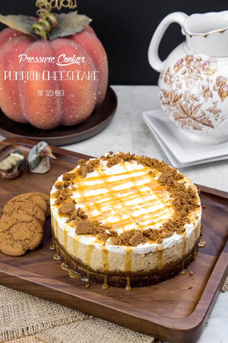 Everyone is going to love this easy Pressure Cooker Pumpkin Cheesecake topped with whipped cream and ginger cookie snaps.