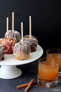 Chocolate covered caramel apples with yummy drizzle and graham cracker crumbs.