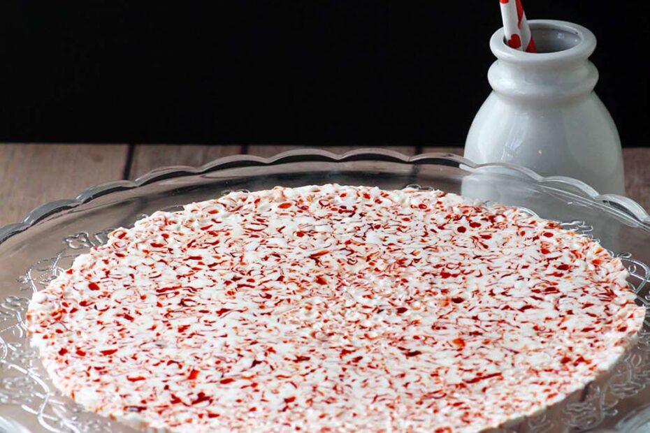 Crushed Candy Canes melted and shaped into a candy cane tray that is perfect for serving Christmas treats on.