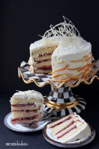 Nothing beats a beautiful White Chocolate Christmas Cake with spiced cranberry filling and sugared orange slices.