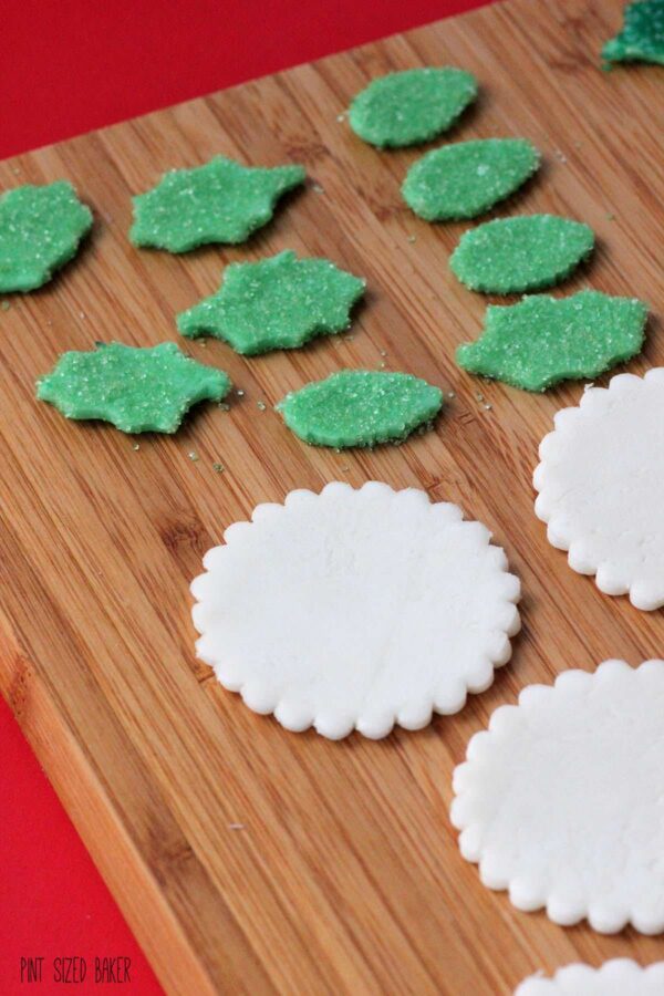 White chocolate marshmallow fondant medallions and leaves.