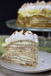 Celebrate a special occasion with a Lemon Meringue Crepe Cake! 15 Crepes layered with lemon cream and topped with meringue! Enjoy!