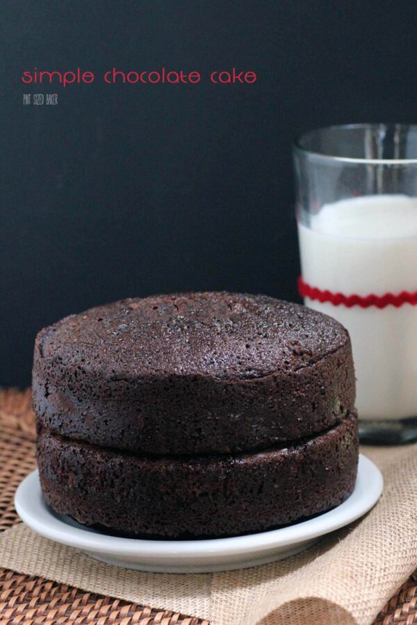 Lead in image of the two layers of chocolate cake unfrosted on a plate.