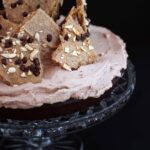 This gluten free chocolate flourless cake is a dense and rich cake covered in whipped cream and topped with mocha meringue bark. 