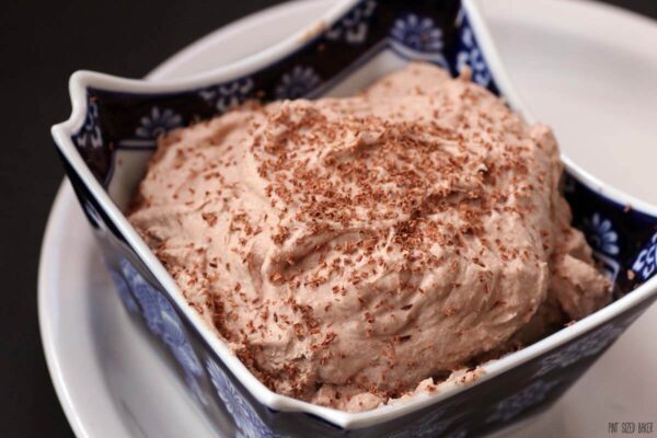 This easy Chocolate Whipped Cream Frosting can be used on just about any dessert. It's light enough for Chiffon Cake and will serve well as a dip for fruit.