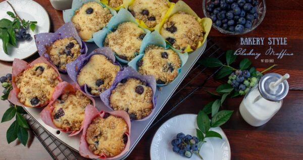 Delicious Bakery Style Blueberry Muffin Recipe that is sure to tempt you to have a second one. My family loves these blueberry muffins with a hint of lemon.